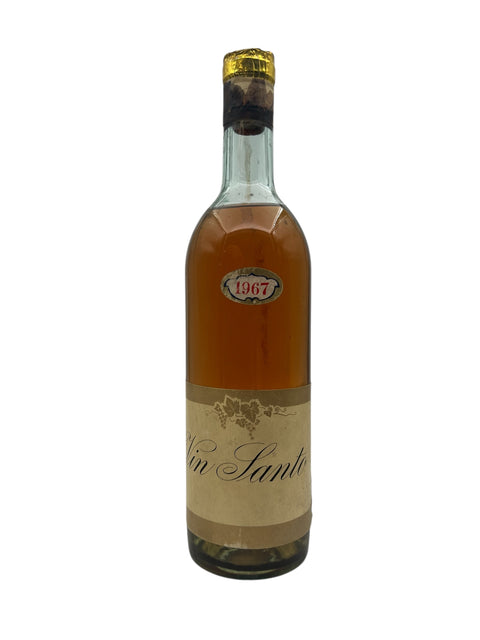 Pullo Vin Santo 1967 kultaisella värillä ja tyylikkäällä etiketillä