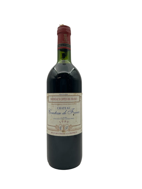 Pullo Chateau Comtesse de Francs 1989 punaviiniä