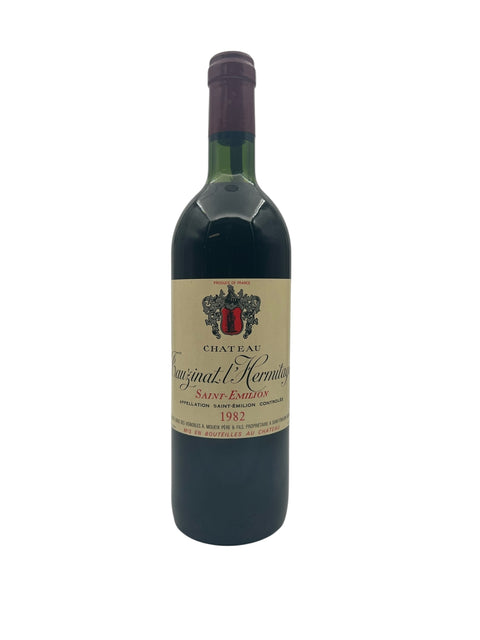 Pullo Tauzinat l'Hermitage Château 1982 punaviiniä