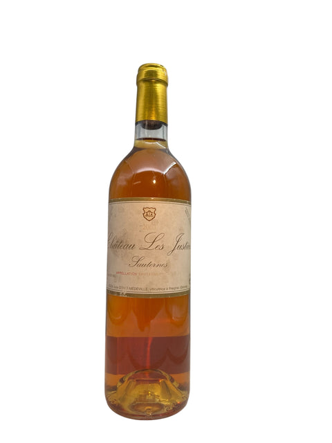 Château Les Justices 2005 pullo kultaista jälkiruokaviiniä