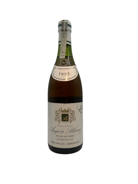 Pullo Anjou Blanc vuodelta 1982, jonka on pullottanut Irma Vin A/S
