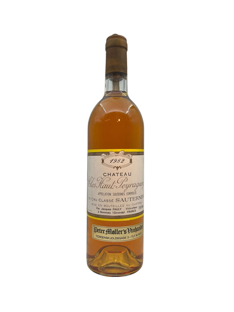 Pullo jälkiruokaviiniä Château Clos Haut-Peyragueysta vuodelta 1982