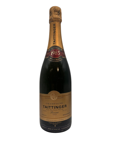 Pullo Taittinger 1983 samppanjaa tyylikkäällä etiketillä